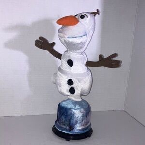 Disney Olaf of Frozen Spinning Talking plush on Base White and Orange
